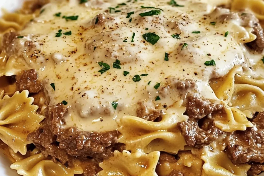 garlic parmesan beef pasta creamy beef pasta recipe bowtie pasta with parmesan and garlic beef and cheese pasta creamy garlic pasta with ground beef Italian-American creamy pasta