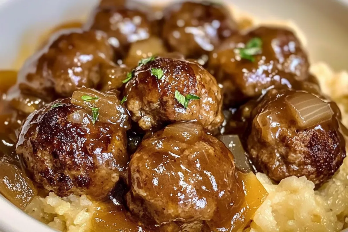Slow Cooker French Onion Meatballs French Onion Meatball Recipe Crockpot Meatballs with Onion Gravy Cheesy French Onion Meatballs Homemade Onion Meatballs in Crock Pot Beef Meatballs in French Onion Sauce Easy French Onion Meatballs Slow Cooker Gruyère Meatballs in Onion Broth